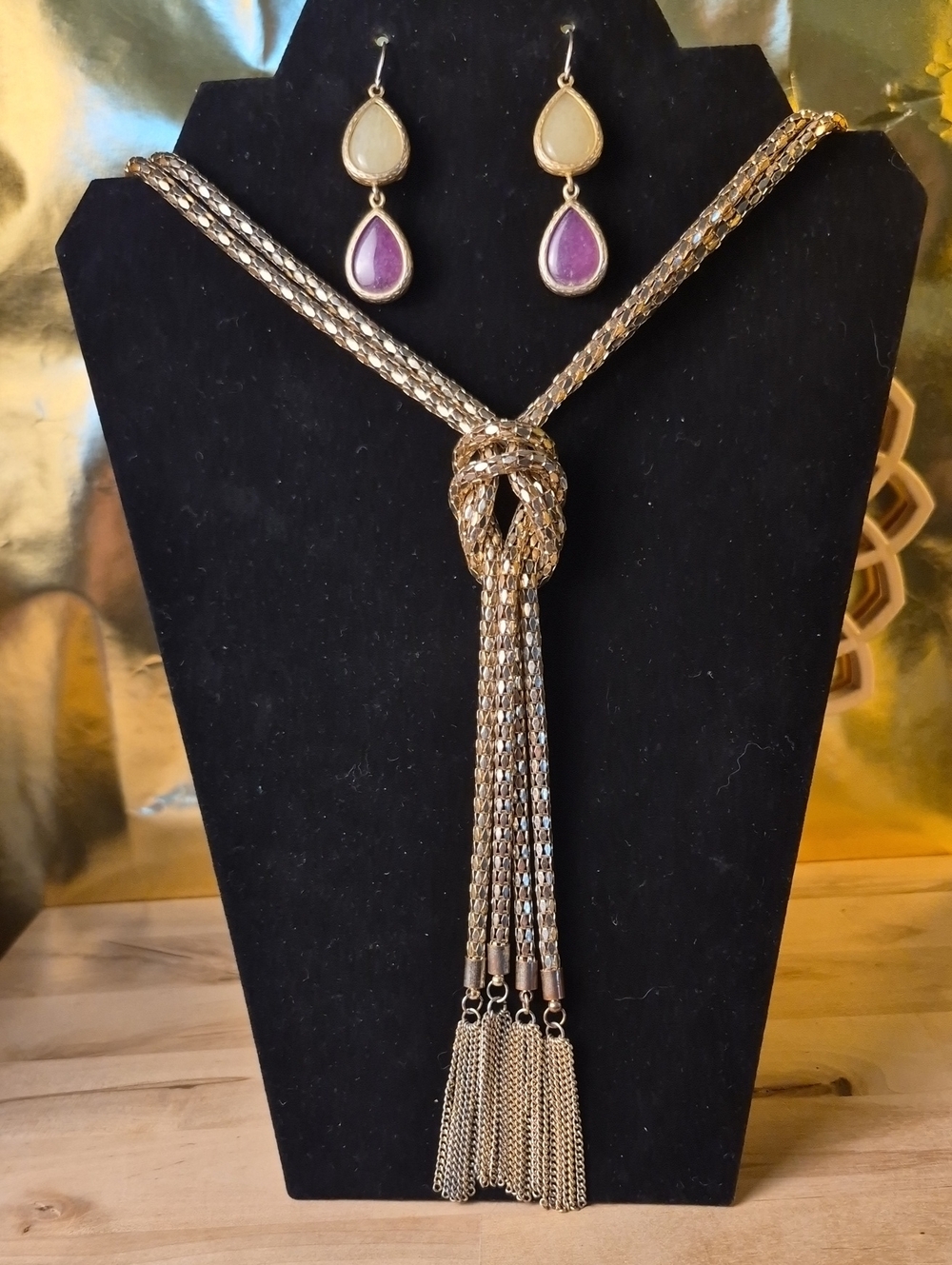 Gold Knotted Tassel Necklace with Purple and Cream Teardrop Earrings